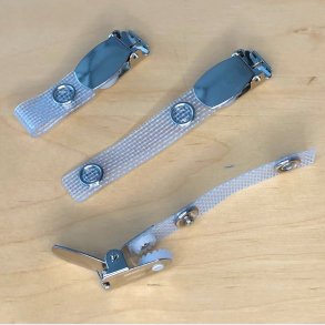 Seleclips med forstrket rem og metaltrykls